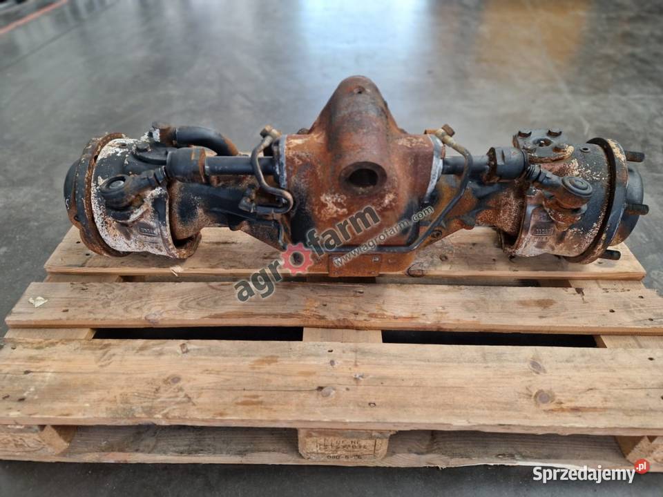 Przedni most Holland TN70VA Case JX1070V Układ kierowniczy i oś przednia Byków