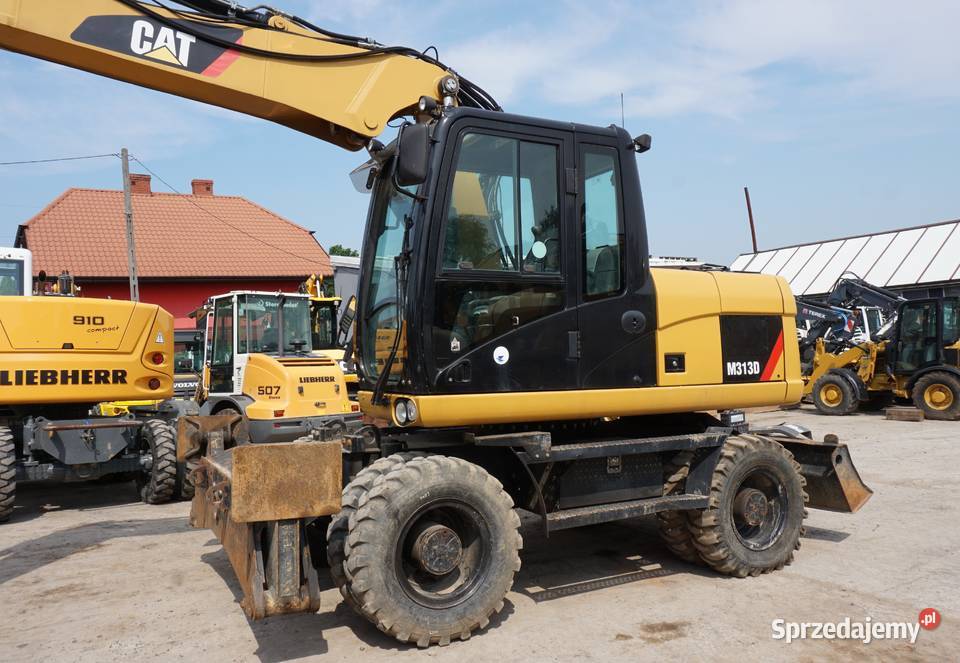 Koparka kołowa CAT M 313 D 2010 Jeziorko sprzedam