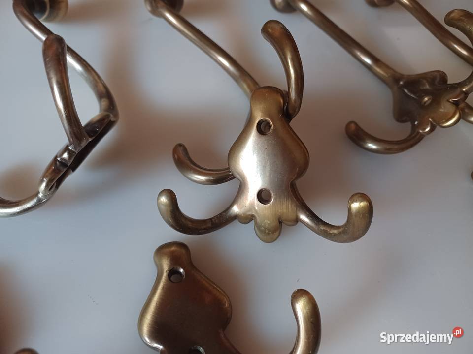 Ładny komplet masywnych wieszaków Mosiądz Poznań