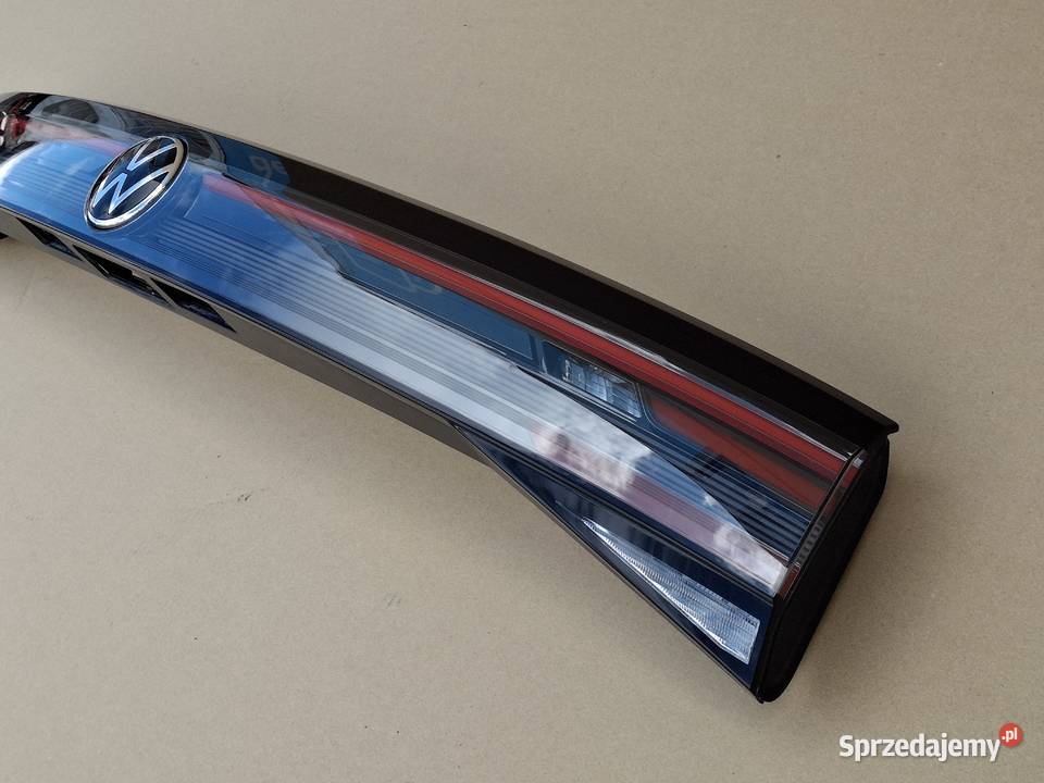 VW TAIGO 2G7 LAMPA KLAPY BAGAŻNIKA TYLNA BLENDA osobowe Bieleń