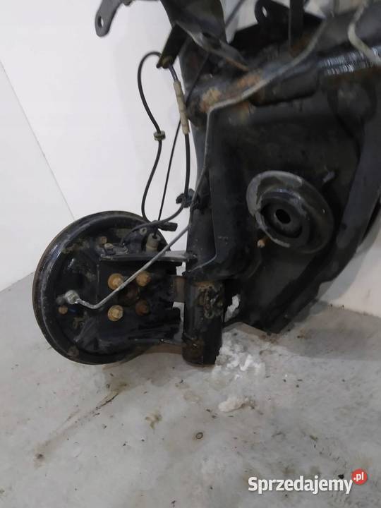 BELKA ZAWIESZENIA TYŁ BĘBNY Renault Clio IV Zawieszenie i amortyzacja