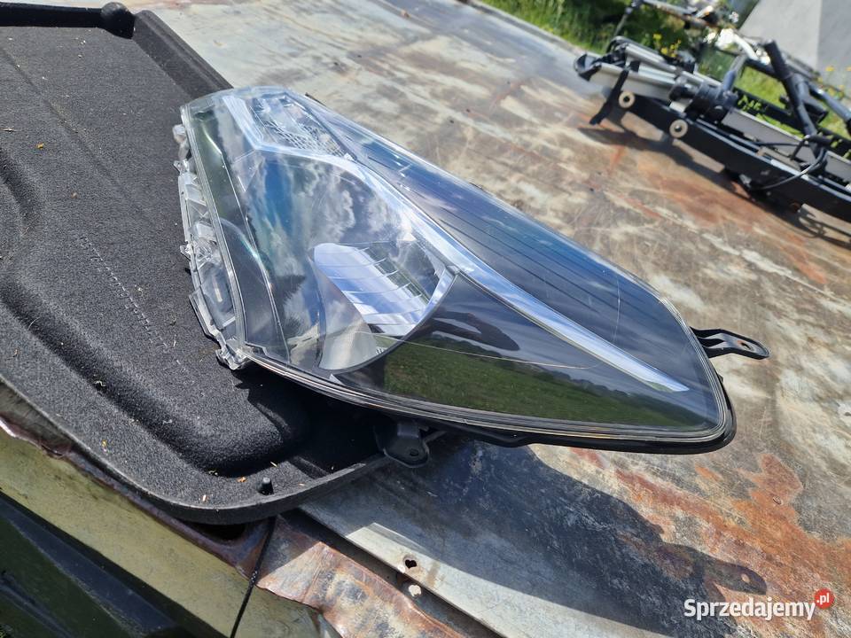 Toyota Yaris III Lift reflektor ORG EU Mielec
