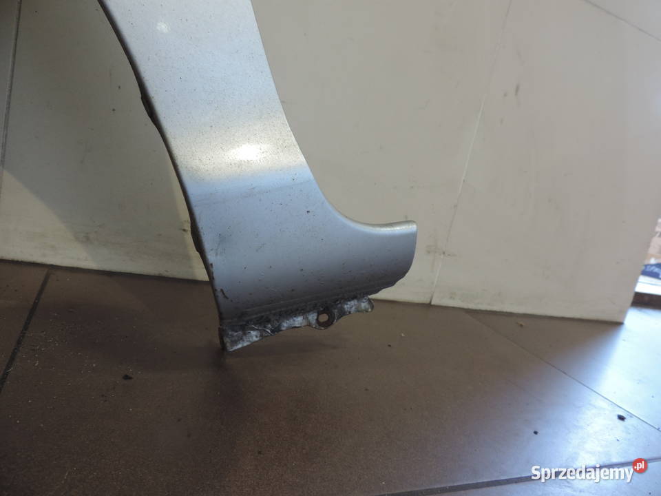 HONDA CIVIC VII BŁOTNIK LEWY PRZÓD NH623M Części samochodowe Nowy Sącz