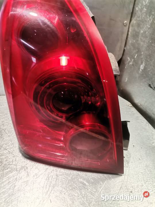 NISSAN PRIMERA P12 HB LAMPA LEWY TYŁ