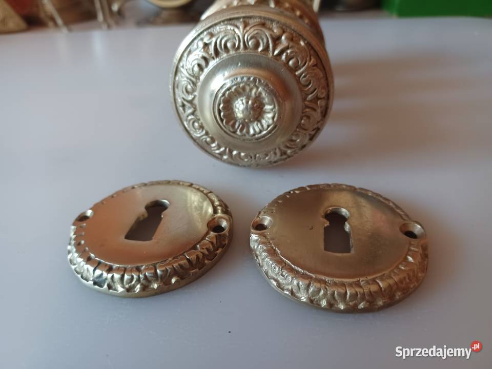 Gałki mosiężne obrotowe z rozetami do drzwi Poznań
