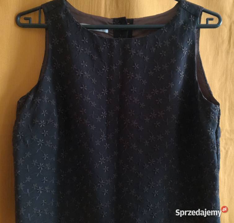 Bluzka bez rękawów z tyłu rozpinanaRozmiar M