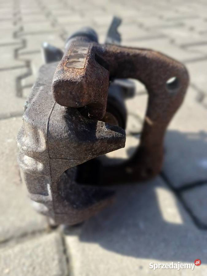 Zacisk hamulcowy z jarzmem oryginalny lewy tył Wodzisław Śląski