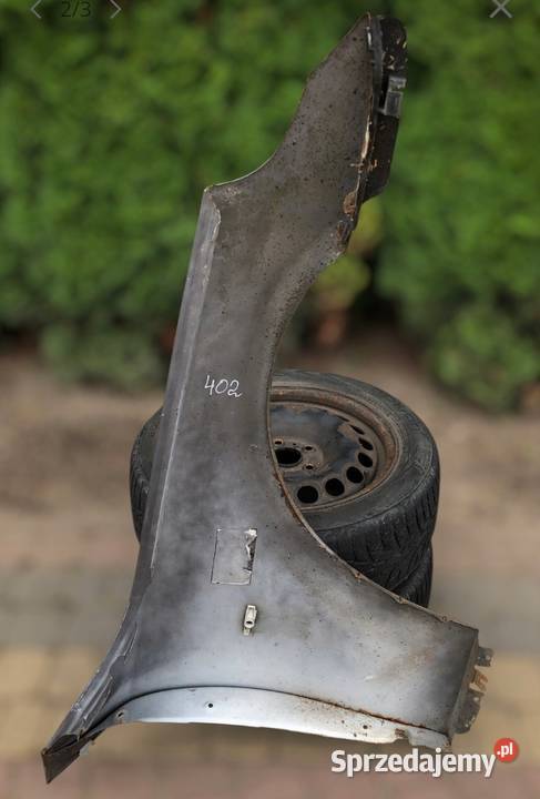 Błotnik lewy BMW E60 E61 lakier nie znany części Skołoszów