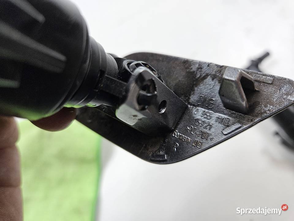 VW TOURAN II SPRYSKIWACZ LAMPY PRAWY PRZÓD osobowe Międzychód