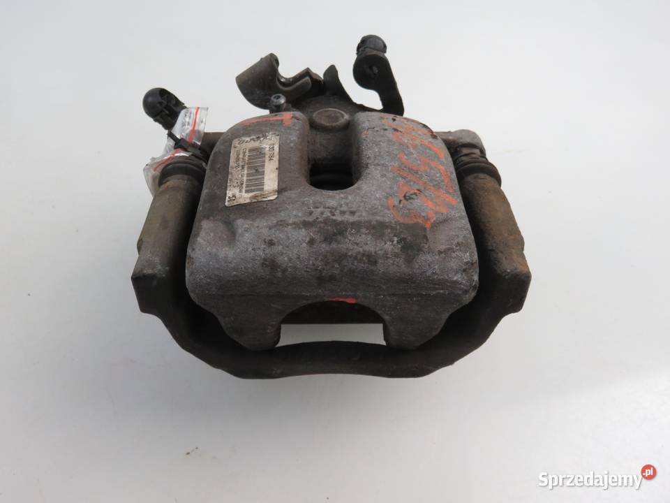 ZACISK LEWY TYŁ PEUGEOT 508 Hybrid4 030784