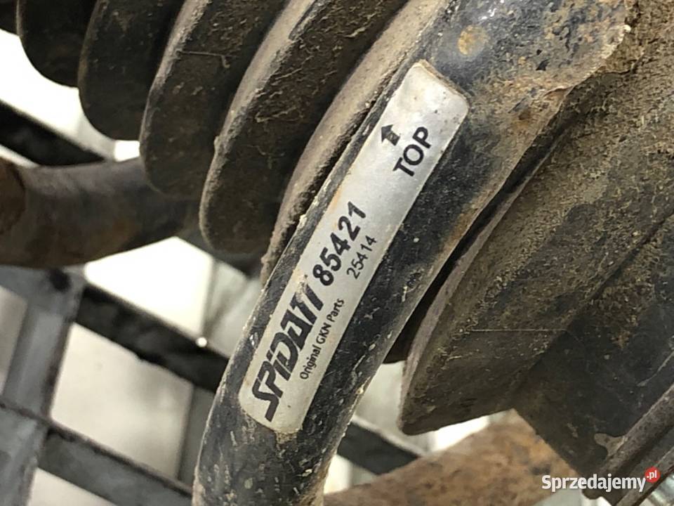 AMORTYZATOR LEWY PRZÓD ZE SPRĘŻYNĄ SUZUKI GRAND