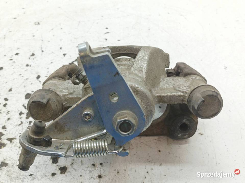 ZACISK HAMULCOWY PRAWY TYŁ 23 DCI MOVANO B