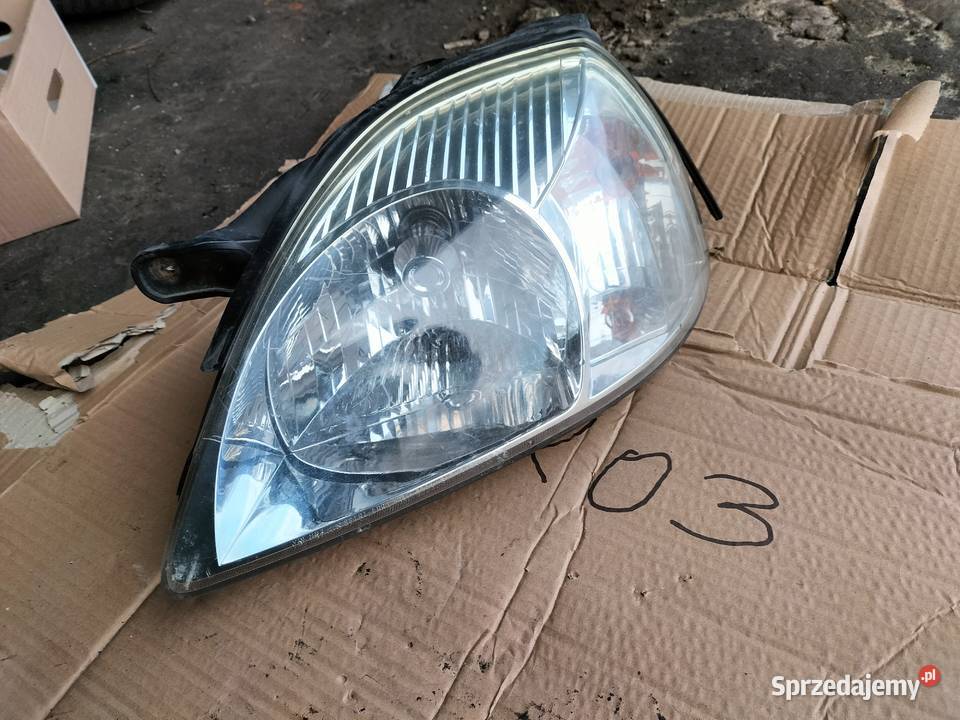 Kia Rio LAMPA PRZÓD PRZEDNIA LEWA lampy przednie Oświetlenie Kamień-Kolonia