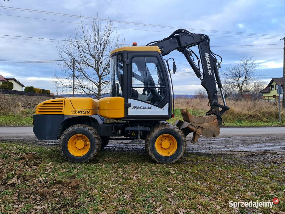 Sprzedam koparkę Mecalac 12 Motoryzacja sprzedam