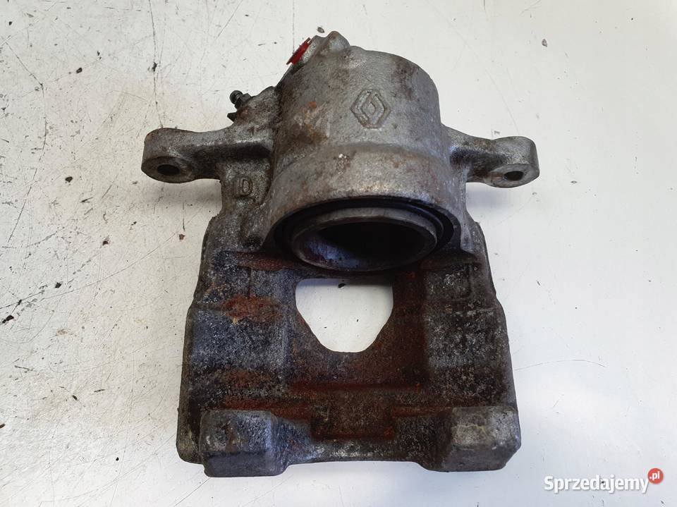 Nissan Micra K14 PRZEDNI ZACISK HAMULCOWY lewy Rudka