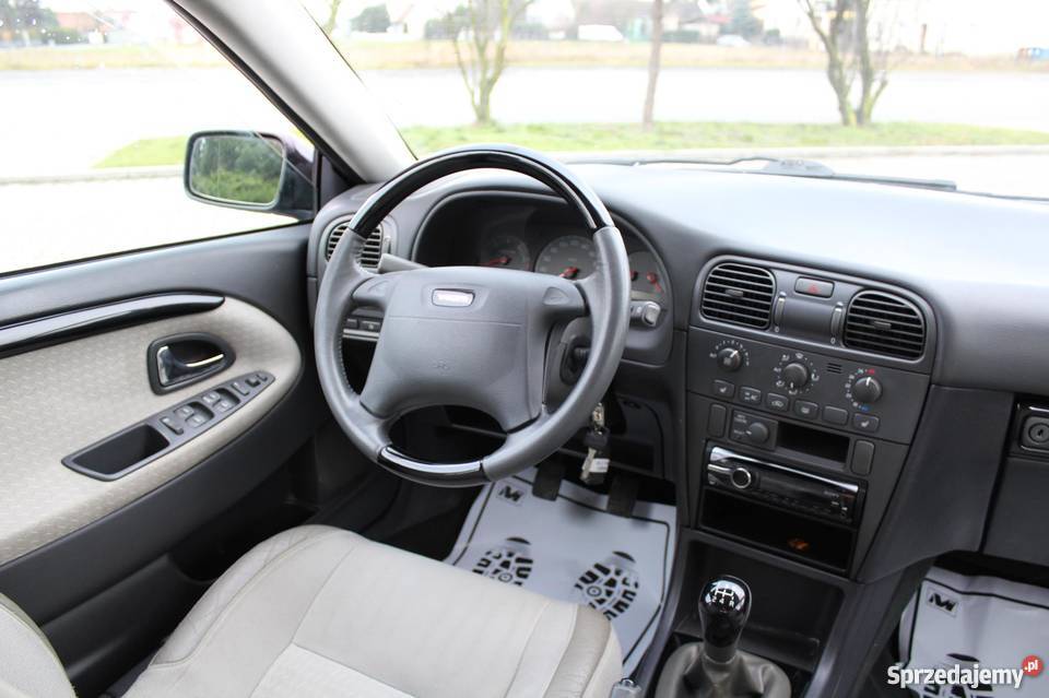 Volvo V40 LIFT 19D 7L100 jasny środek 2x kpl CD Poznań