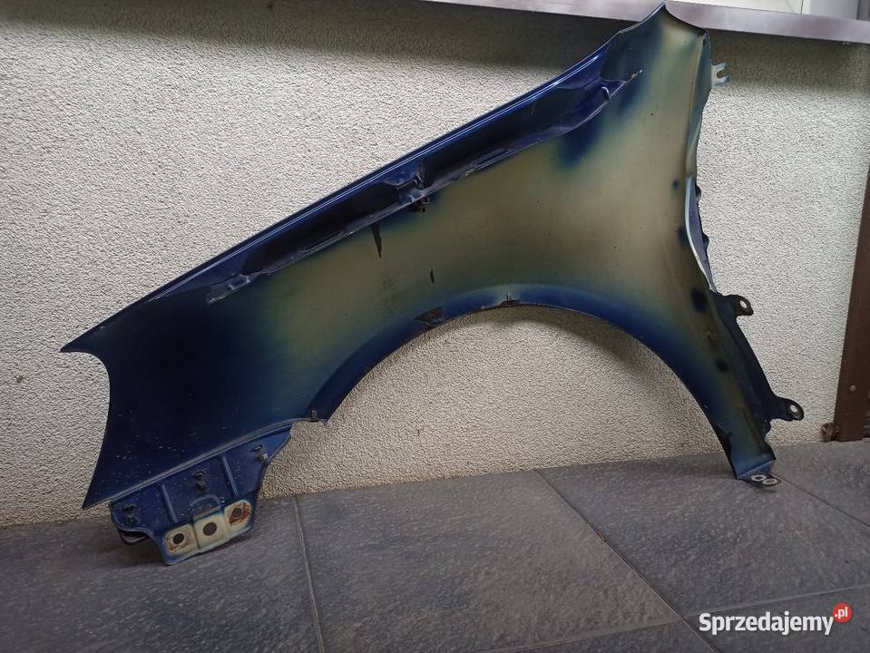 VW Golf V 5 błotnik przedni prawy granatowy LD5Q