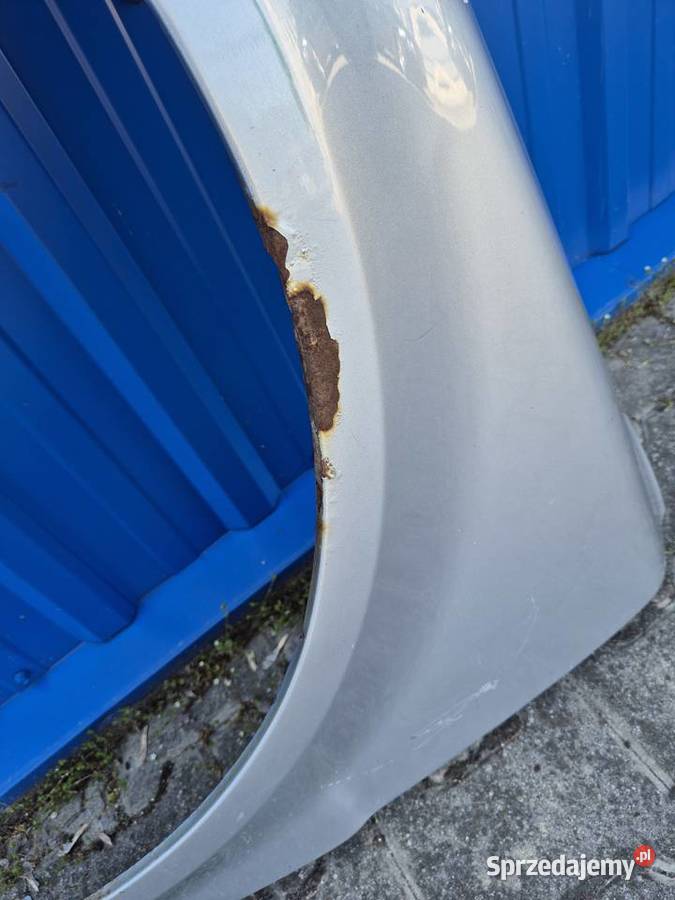 BŁOTNIK PRZÓD LEWY VW PASSAT B5 FL LA7W SREBRNY Błotniki Działoszyce