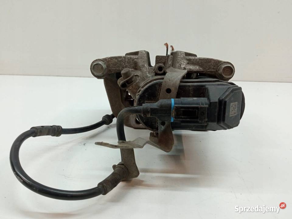 ZACISK HAMULCOWY LEWY TYŁ ELEKTRYCZNY 4030020