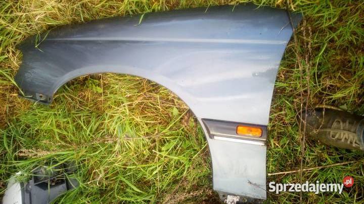 Błotnik przedni lewy OPEL l OMEGA b szary bez Margonin
