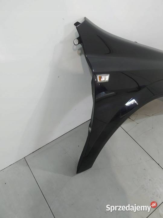 BŁOTNIK PRAWY PRZÓD CZARNY Opel Astra III