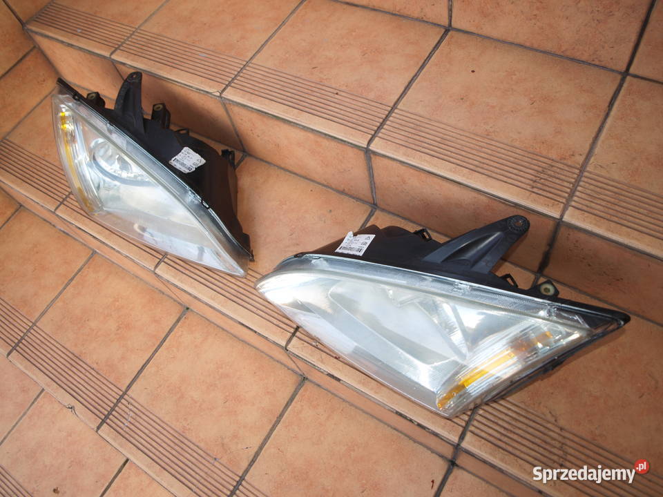 Ford Focus Mk2 lampy przód zwykłe 2004 2008r Części samochodowe Kalisz