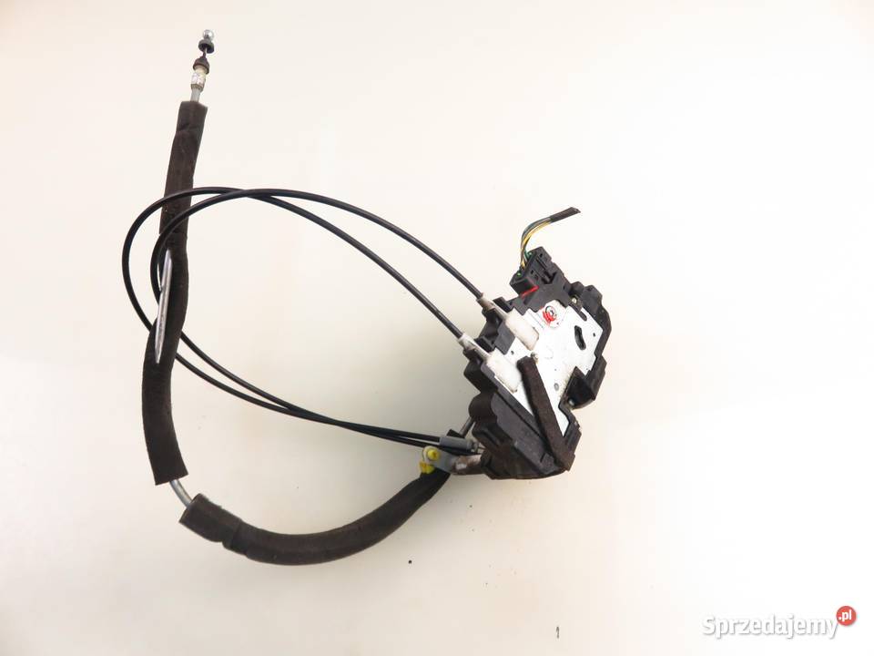 ZAMEK LEWY PRZEDNI NISSAN VERSA I