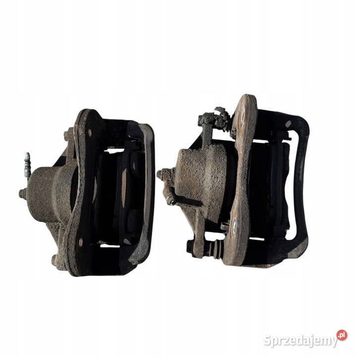 Zacisk jarzmo hamulca prawe Kia Sportage II 2 Zaciski i jarzma Barłogi