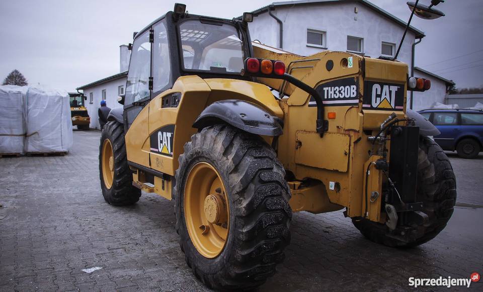 Ładowarka kołowa terenowa CATERPILLAR CAT TH330B koparki i ładowarki
