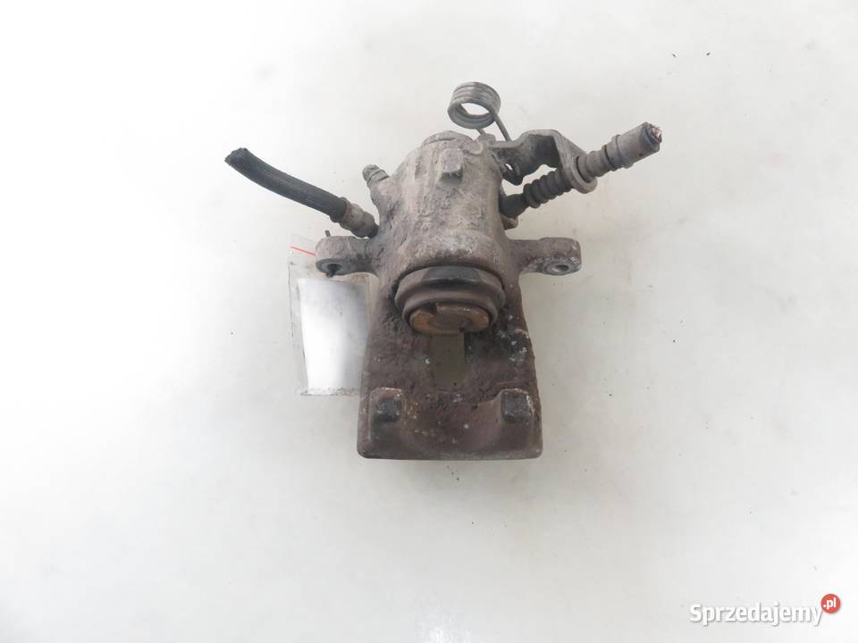 ZACISK PRAWY TYŁ OPEL ASTRA III H GTC Motoryzacja