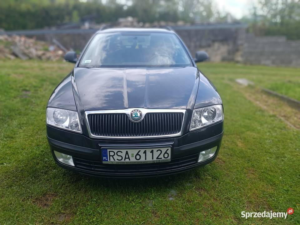 koda Octavia II kombi 2012 welurowa tapicerka