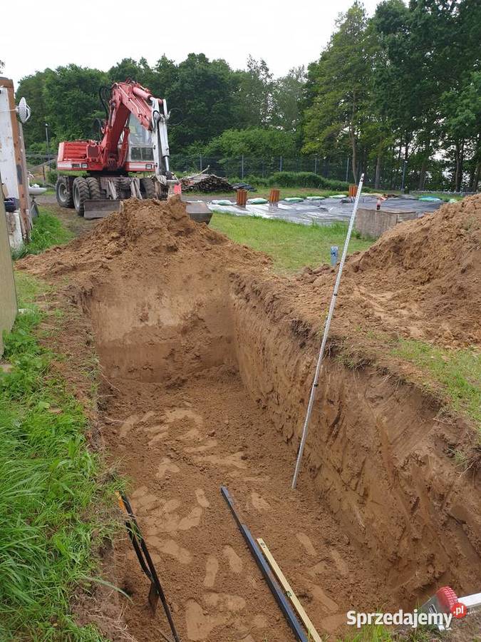 Usługi koparką kołową rozładunek palet wykopy Białuń