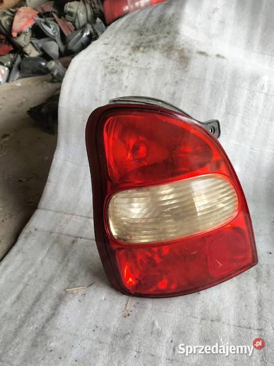 KIA CARNIVAL I LAMPA TYŁ TYLNA LEWA lampy tylne Kamień-Kolonia