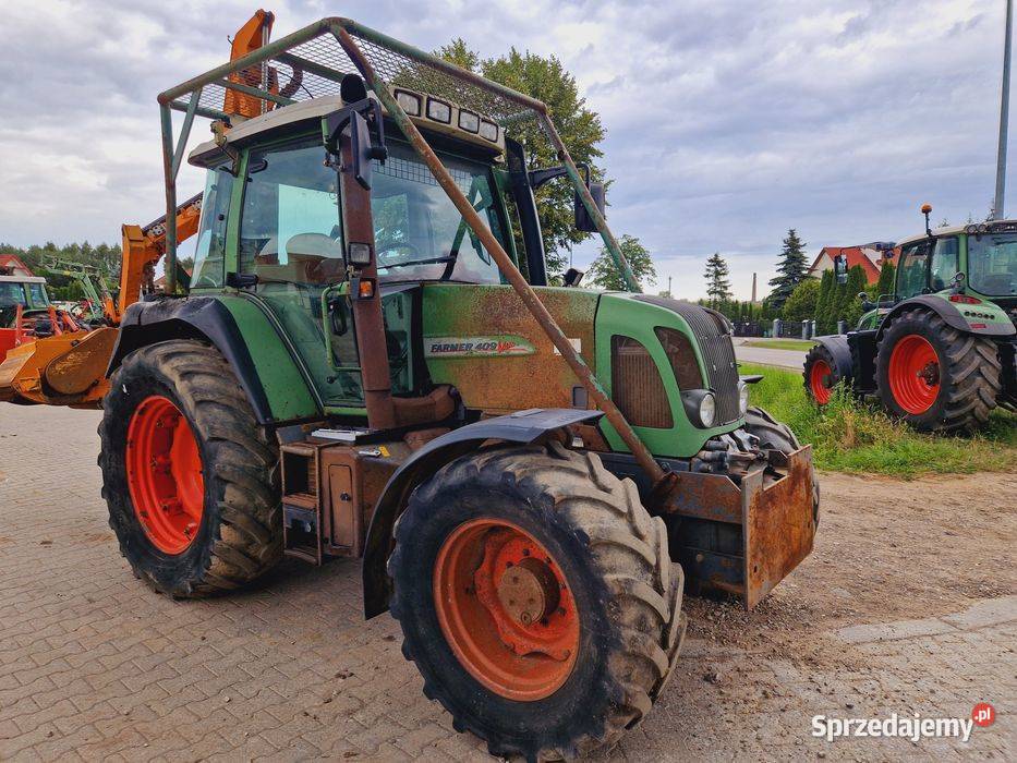 Fendt Farmer 409 Vario z kosiarką wysięgnikowa Dobrzyniewo Duże