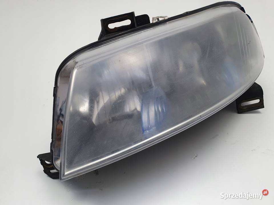 LEWA lewy Fiat Stilo 0107r PRZEDNIA LAMPA przód Rudka