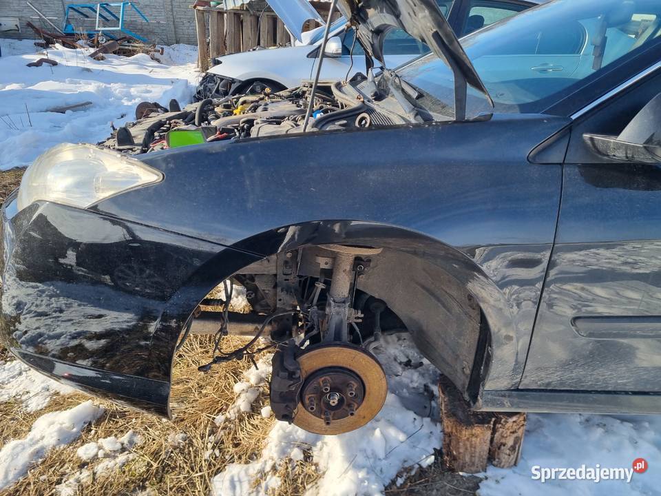 RENAULT LAGUNA 3 III 0715 KOMBI BŁOTNIK LEWY osobowe Części samochodowe podkarpackie Kolbuszowa