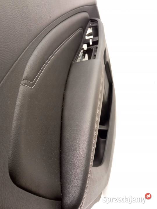 TAPICERKA BOCZEK LEWY TYŁ EM2BR27473A Ford