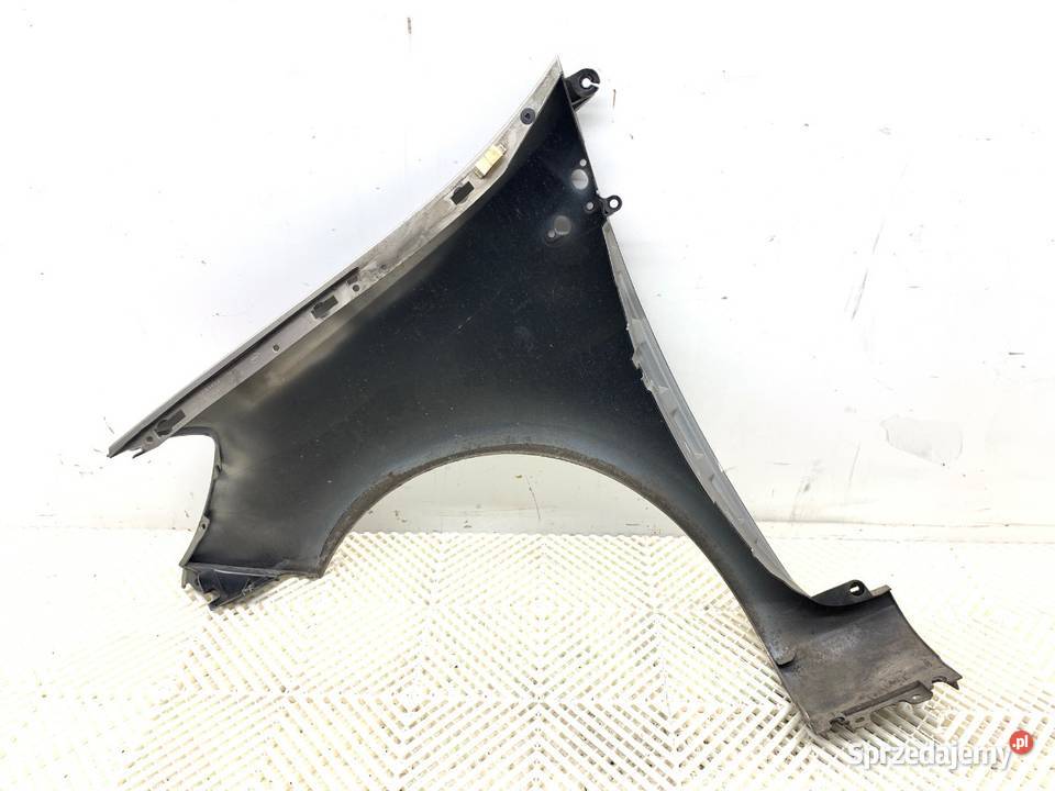 BŁOTNIK PRAWY PRZÓD RENAULT CLIO III Hatchback