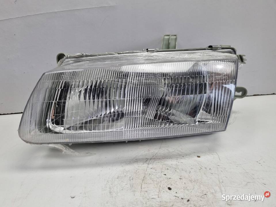 LAMPA LEWA Mazda 323 BA 9598r PRZEDNIA LEWY Rudka