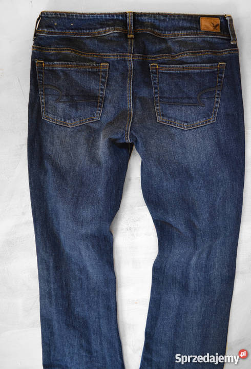 modne jeansowe spodnie z przecieraniami 40 L