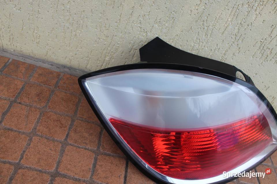 LAMPA LEWY TYŁ TYLNA OPEL ASTRA H HB 5D 24451835 osobowe Lampy przednie Motoryzacja
