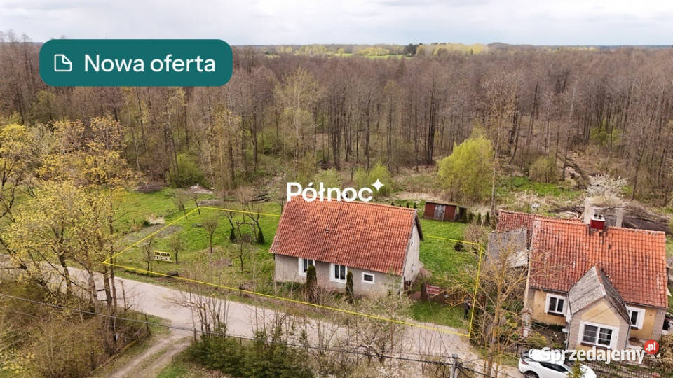 Stożne wiejski domek z drewutnią i ogrodem