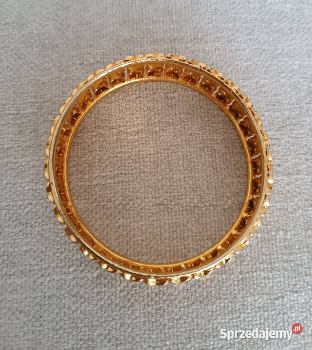 Szeroka bransoletka w kolorze złota z Uniseks Radzyń Podlaski