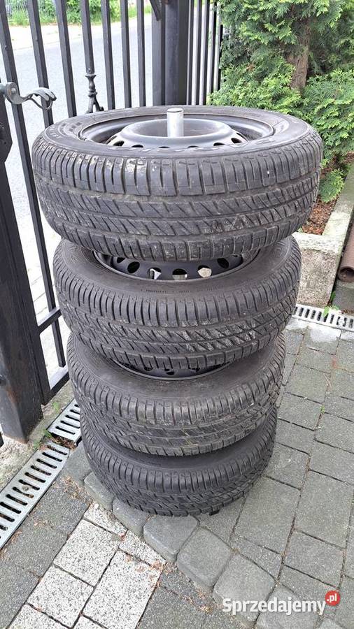 Opony letnie 1856514 z felgami i stojakiem Opony Libiąż