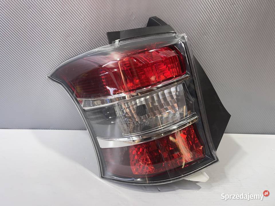 TOYOTA IQ LEWA LAMPA TYŁ Ostroróg