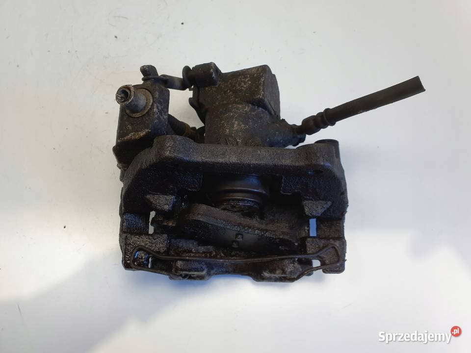 Toyota Yaris III TYLNY ZACISK HAMULCOWY lewy tył osobowe Rudka