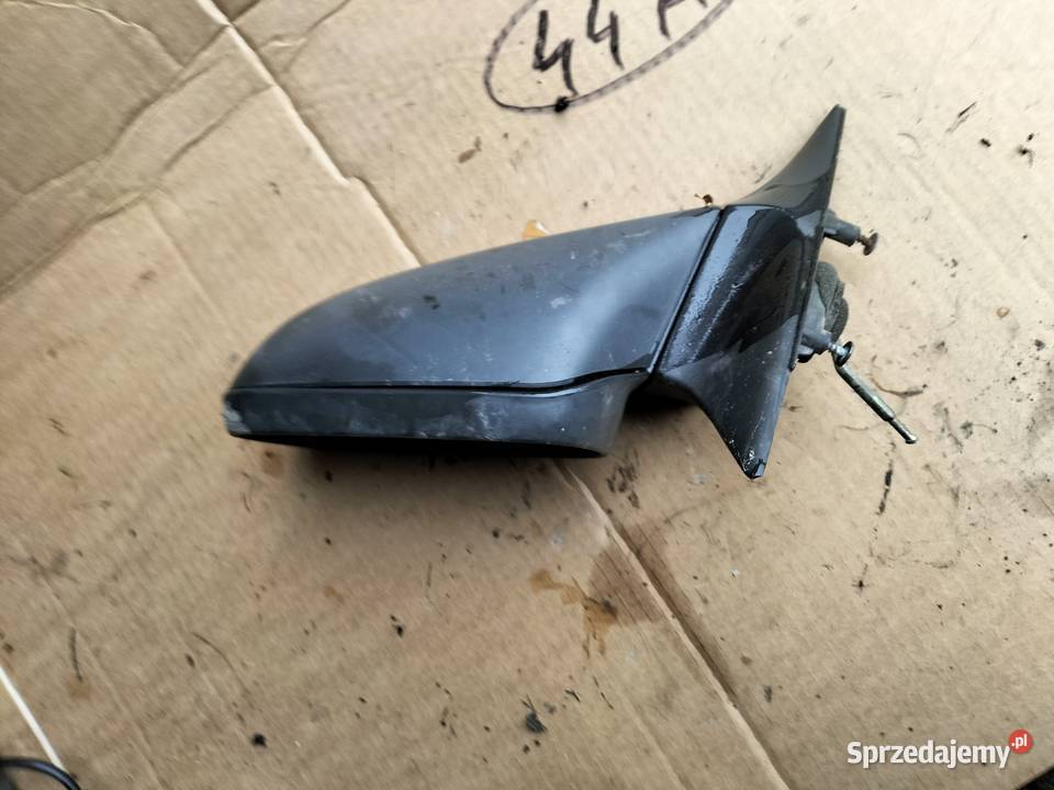 OPEL ASTRA F LUSTERKO ZEWNĘTRZNE LEWE MANUALNE Lusterka zewnętrzne Kamień-Kolonia