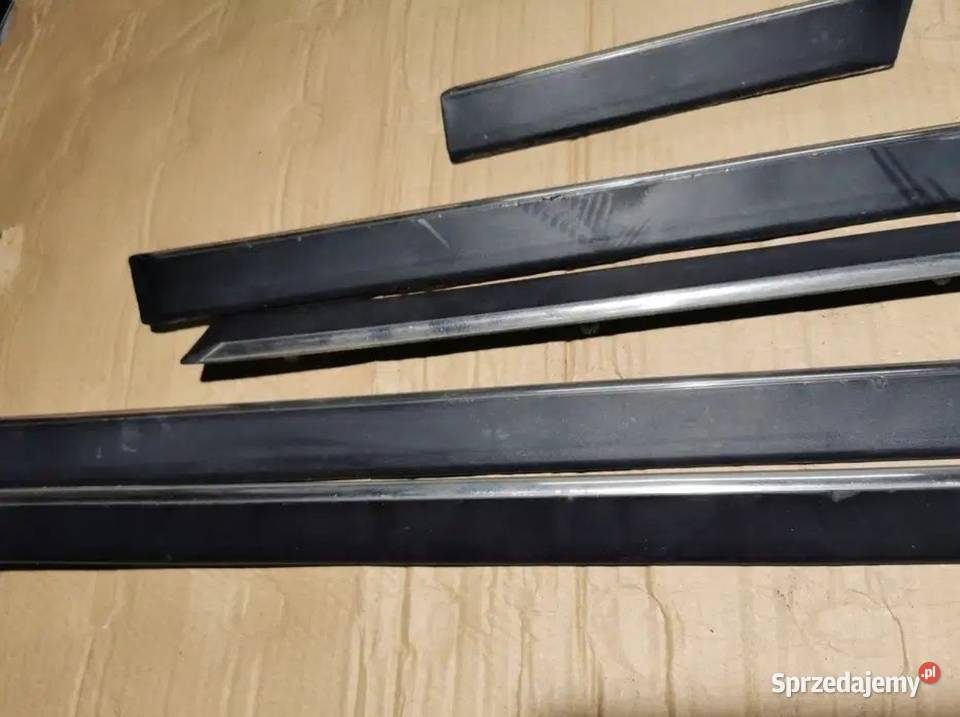 Listwy boczne drzwi błotników BMW E39 komplet
