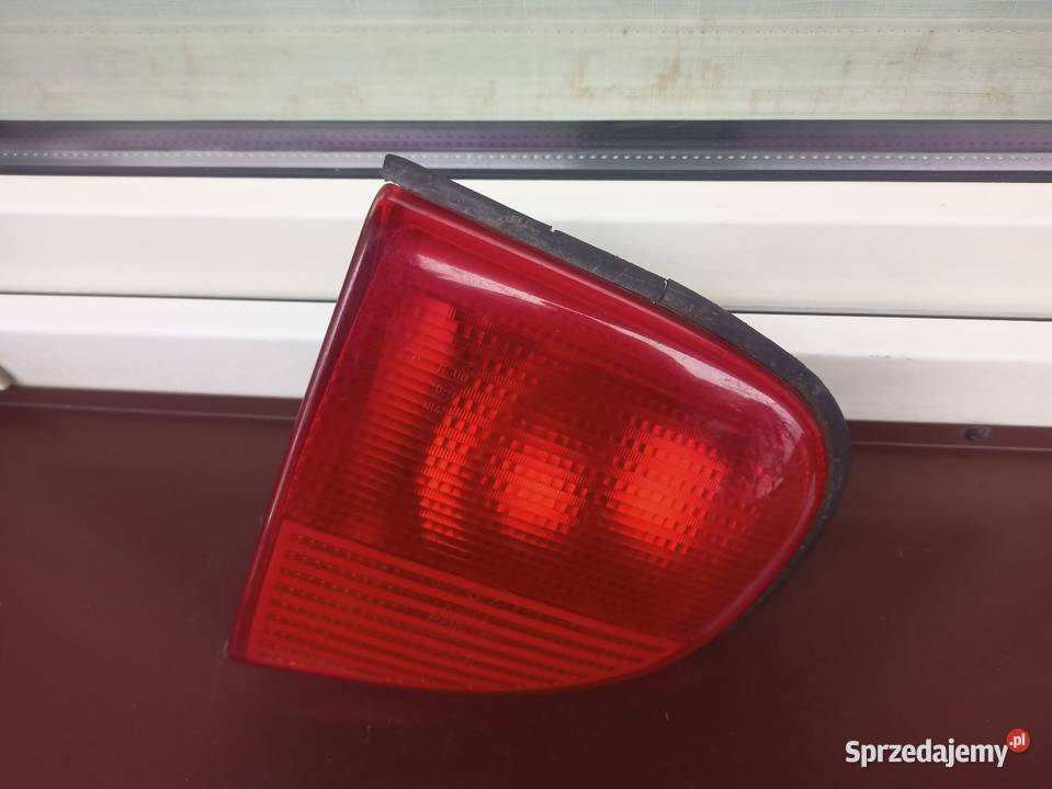Ford Escort MK7 VII lampa tył tylna lewa w klapę osobowe Sieradz