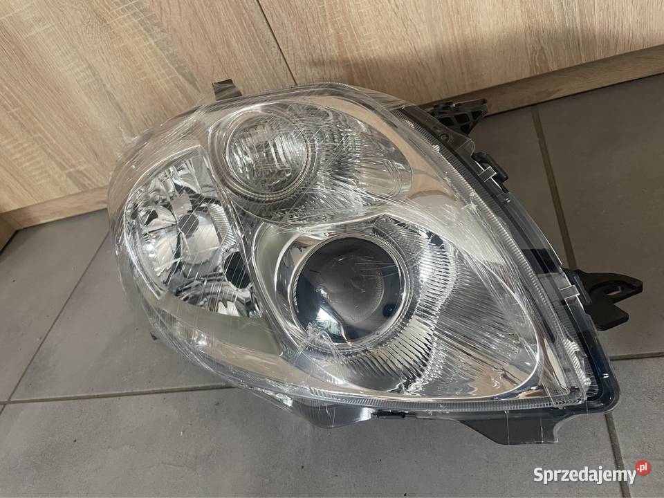 Toyota Auris I Lift reflektor przód Nowy lampy przednie Kozubszczyzna